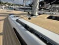 Self-tacking jib or overlapping genoa. The buyer can decide or choose both variants