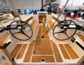 The cockpit is characterised by two wheels - as well as a heated seat for the helmsman.