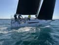 Harmonious lines, wide stern, flat cabin superstructure. The First 30 also looks great.