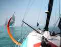 The view from "Malizia - Seaexplorer" to the foggy competition.