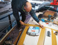 Yachts are rarely really symmetrical. Adhesive strips following the superstructure contours help to align the hatches harmoniously