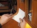 Fitting: After sawing out, the rounding must be precisely adjusted. To regrind it, use drain pipes of different diameters covered with sandpaper