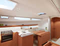 Below deck, the new model adopts the style and layout of its big sister, the J/45, but the saloon looks much more compact