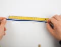 Für den Knoten 20 Zentimeter vom Ende her abmessen und …