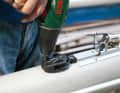 Once the right drill bit has been found for the screw and the fitting is in place, the hole can be drilled