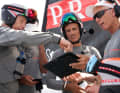 Le coach Philippe Presti avec les barreurs Francesco Bruni et Jimmy Spithill