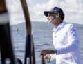 Paul Cayard at the wheel