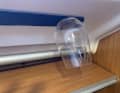 A magnetic glass holder ensures rattle and shard-free organisation in the cupboard