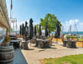Eating and drinking with a view: View of the terrace of the "Værftet Restaurant" in Marina Minde. The harbour jetty in the background