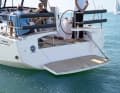 The large bathing platform is an option. The attachable bathing ladder rests in the forecastle box
