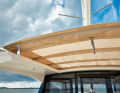 The gap between the bimini sides can be closed with a robust tarpaulin with poles to keep out the rain and sun