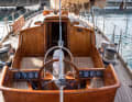 Division of labour: The helmsman sits behind a high coaming, well separated from the crew and the drum-sized sheet winches