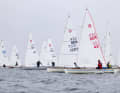 Arne Assmann (GER 42) e Ingo Hüter (GER 1227) sono i primi inseguitori dell'olandese Thies Bosch nelle derive olimpiche.