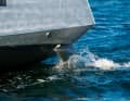 The two stub rudders remain short to dry out. The kinks in the hull are prominent