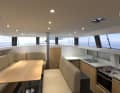 Deck saloon with raised seating area, plus an all-round glazed cabin superstructure. The view from the saloon is magnificent.