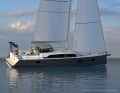 The overlapping genoa is standard equipment, as is the typical equipment carrier at the stern.