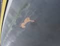 Typical picture, the various layers of colour of the antifouling peel off over a large area