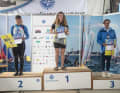 Award ceremony for the ILCA 6 women: 1st Anna MUNCH from Denmark, 2nd Petra MARENDIC from Croatia and 3rd Aleksandra LUKOYANOVA from Bulgaria.