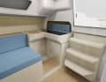 On request, the shipyard can also install a small kitchen module to the side of the companionway. The toilet room opposite is designated as a separate cell