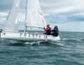 With the crew sitting aft, the bow goes well over the small waves