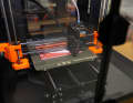A 3D printer in the workshop of Ersatzteildrucken.de.