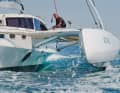 The hulls can be retracted into the harbour using a folding mechanism. This reduces the width by three metres