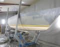 The residual moisture of the blasted laminate is measured and the body is dried if necessary