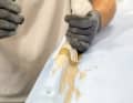 Once the laminate has cured, the peel ply is removed. It leaves behind a rough surface that can be worked on immediately. This also pays off when sanding, as the paper does not stick so quickly