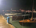 "Rémy" with mast down in Kiel-Schilksee before the storm. The neighbouring classic threatened to severely damage the ship