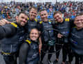 The proud Australian winners around helmsman Tom Slingsby (2nd from right).