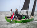 In windy conditions, the crew sits well and safely on the high edge