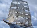 The 117 metre long three-master sails with 2758 square metres of canvas and 65 crew.