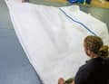 When hoisting the mainsail, hoist it onto the luff. If all the sliders are on top of each other, they will not stain the cloth