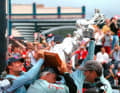 The big four have their hands on the silver jug: Ernesto Bertarelli, Brad Butterworth, Russell Coutts and Jochen Schümann