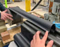 The tubular masts of the sun sail are made of carbon fibre and can be rolled up when pressed flat