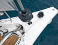 The bowsprit blends harmoniously into the hull, the vertical windlass sits outside the hull