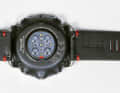 It comes with a leather and silicone strap