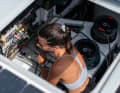 Cole Brauer works in the pit of "Malizia - Seaexplorer". Fresh air is available here through the large deck hatch.