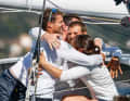 The "Biotherm" winners embrace each other in happiness.