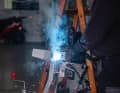 Re-weld the joint. The bare metal must then be protected against rusting with zinc spray