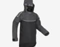 The smock does not let water through. The hood and neo cuffs are the main reasons for this.