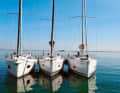 Inflated. The hulls of all three ships are very full. The Hanse 388 appears somewhat smaller