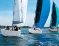 Wide sterns, lots of volume. The hull shapes ultimately determine the amount of space below deck