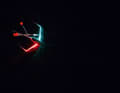 In complete darkness, a reflective wind indicator is a safe aid