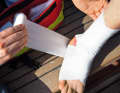 The joint is then compressed with an elastic bandage, which also supports and relieves the joint