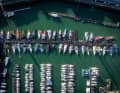 The starting yachts in the harbour of Les Sables-d'Olonne: "Malizia - Seaexplorer" can also be seen from above (8th Imoca from bottom right)