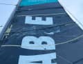 Sam Goodchild's mainsail: back in action after major repairs.