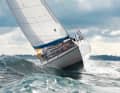 The heavy hull of the Vindö pushes through the waves