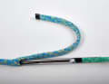 About 30 centimetres from the end of the sheath, the halyard is fed into the sheath using a splicing fid. The long end is needed to splice the sheath later with a smooth transition into the halyard