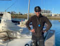 Hendrik Lenz del Düsseldorfer Yacht-Club davanti alla sua Mini.